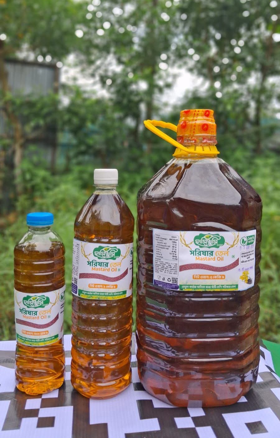 কাঠের ঘানিতে ভাংগানো খাঁটি সরিষার তেল